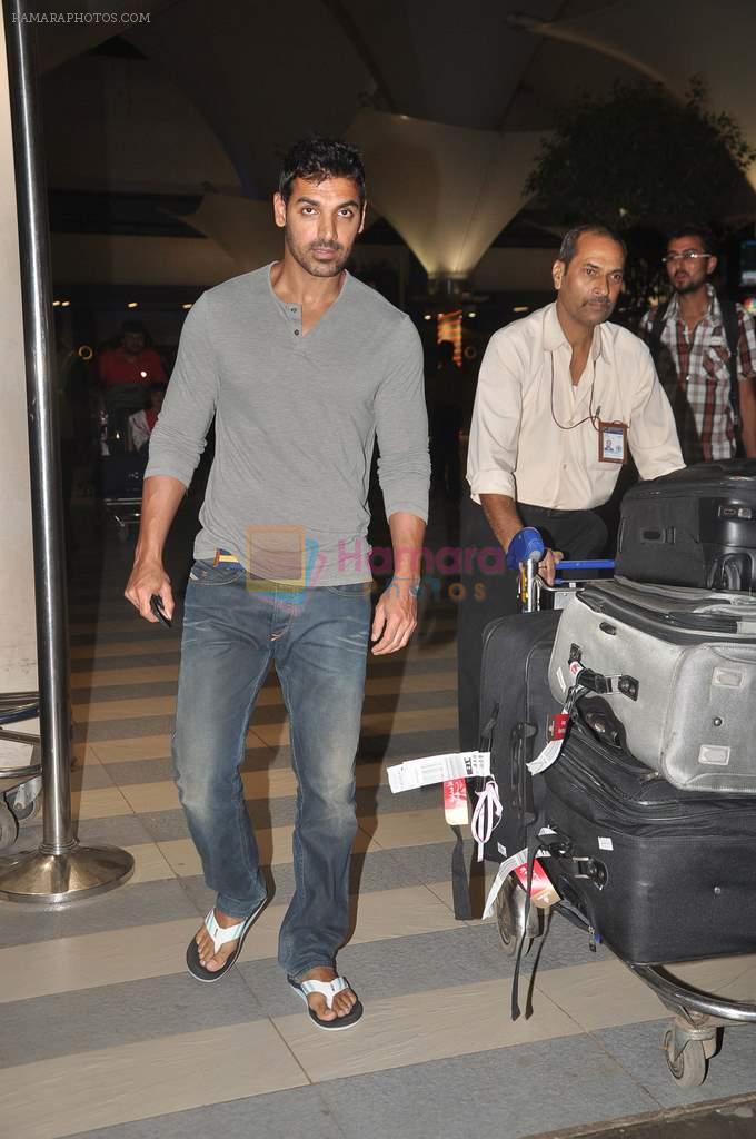 John Abraham snapped at the airport in Mumbai on 4th Jan 2012