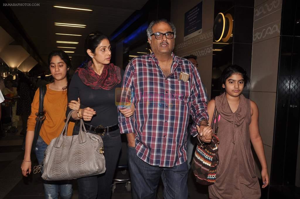 Sridevi, Boney Kapoor with Kids snapped at the airport in Mumbai on 4th Jan 2012