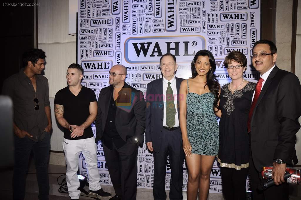 Mugdha Godse, Milind Soman at the launch of World's leading Grooming brand- WAHL in Mumbai on 14th Jan 2012