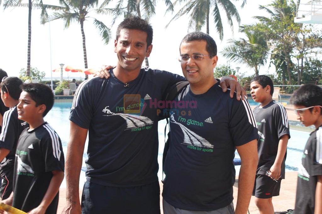 Ritwick Bhattacharaya with Chetan Bhagat at NDTV's Marks for sports workshop at Otters club, Bandra