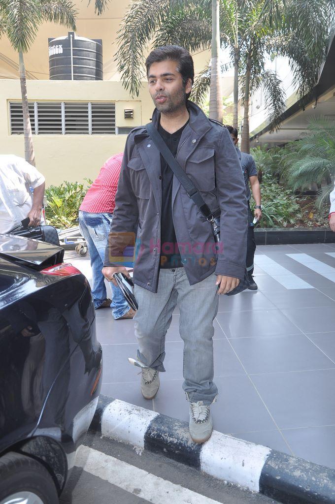 Karan Johar snapped at Airport in Mumbai on 11th March 2012-1