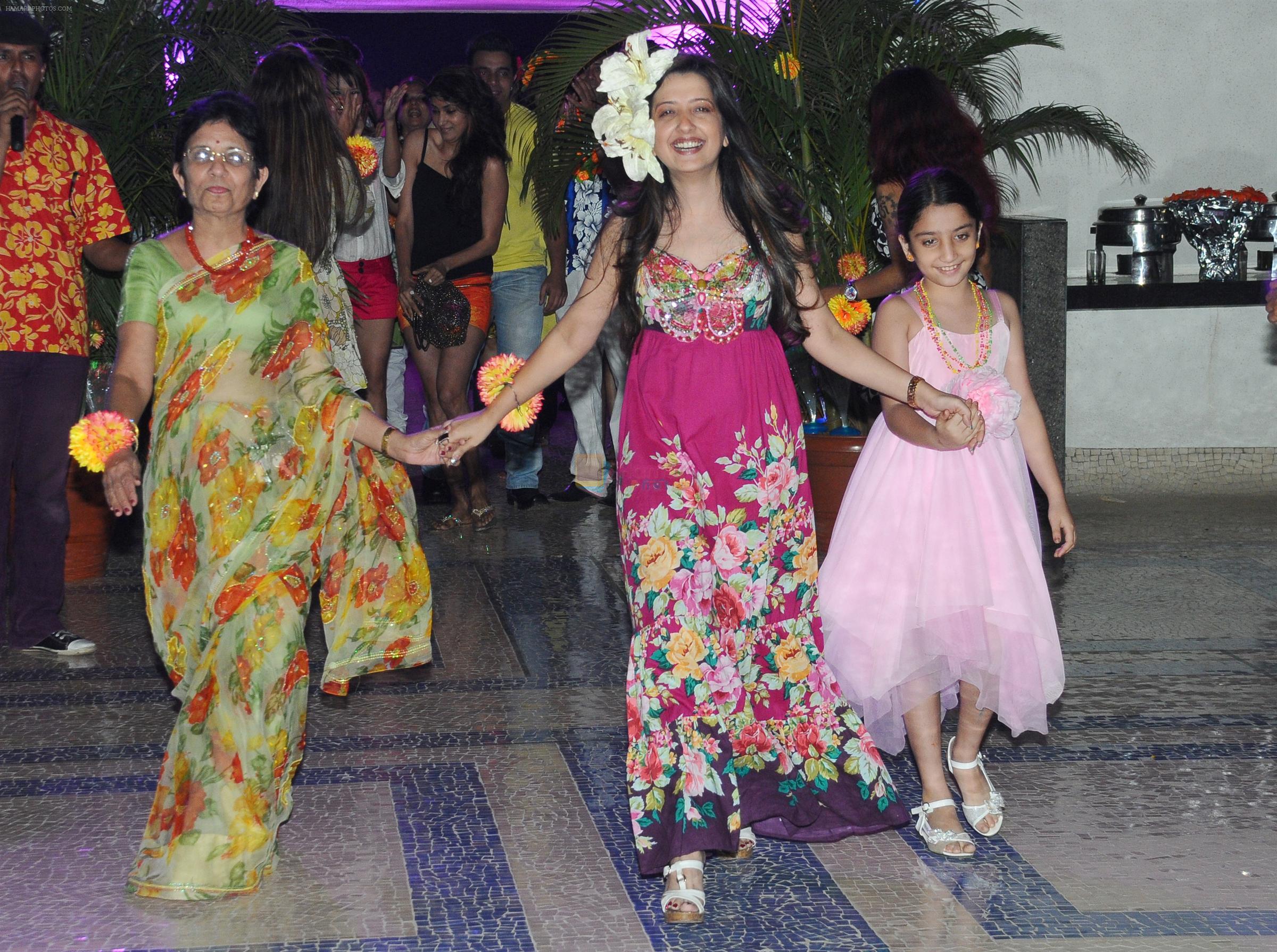 Amy Billimoria with her mother and daughter at Naughty at forty Hawain surprise birthday party by Amy Billimoria on 12th March 2012