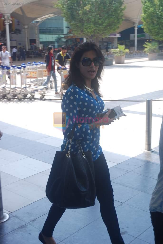 Chitrangada Singh snapped at airport in Mumbai on 17th March 2012
