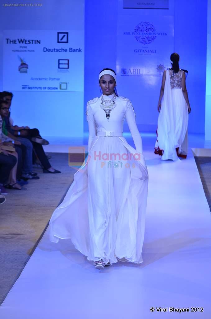 Model walk the ramp for Nitya Bajaj Show at ABIL Pune Fashion Weekon 14th April 2012