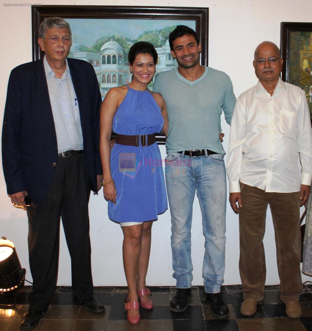 Wrestler Sangram Singh with Payal Rohatgi and curator Nitin Shete with artist Houserao Patil at Nitin Shete's  Eclectic Blend-- collection of works by  veteran artists at Coomaraswamy hall