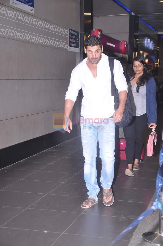 John Abraham snapped at airport, Mumbai on  25th May 2012