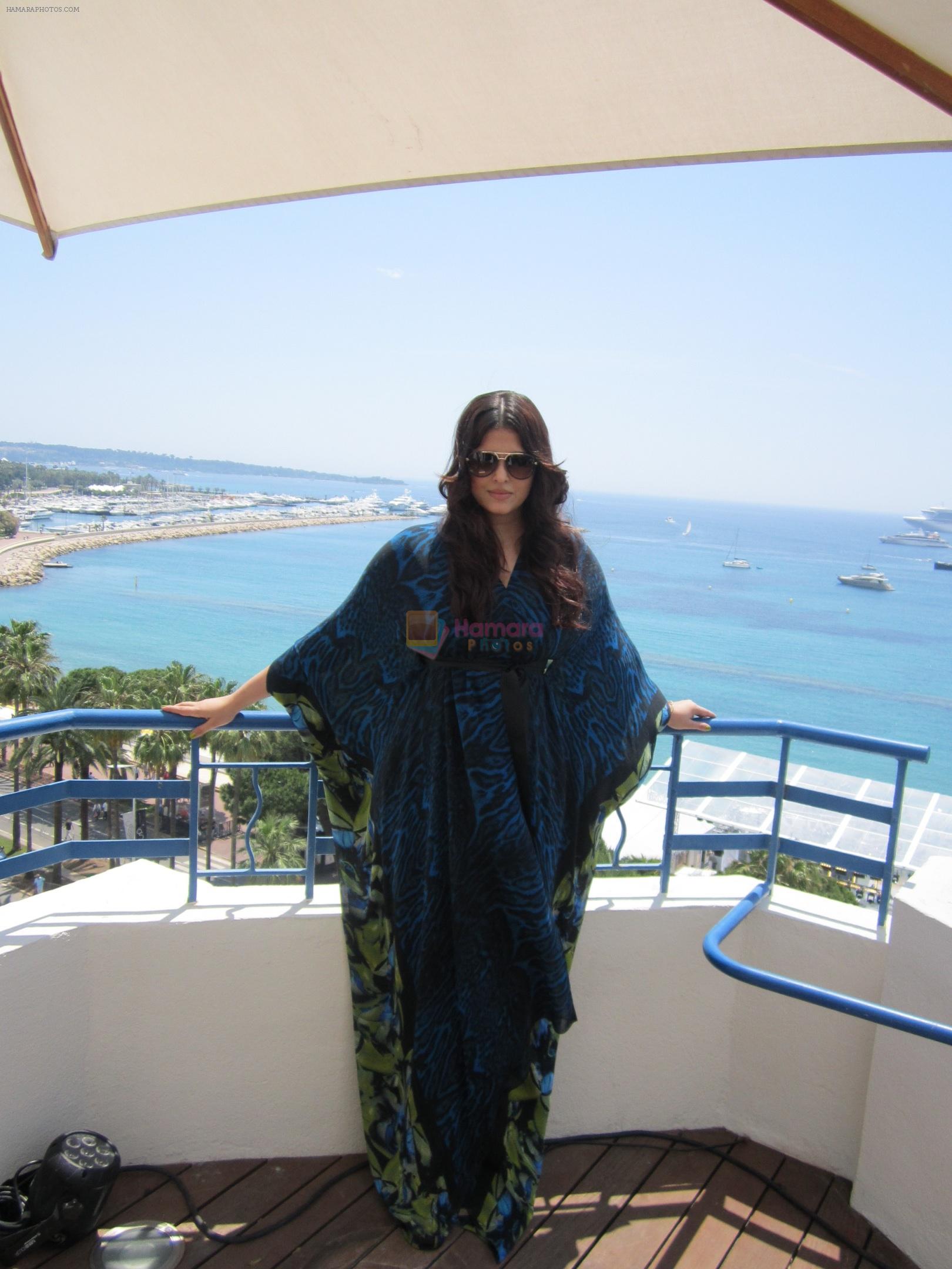 Aishwarya Rai Bachchan is wearing Roberto Cavalli Kaftan and the shoes are Giuseppe Zanotti at the Media Call Day 2 at Cannes Film Festival on 23rd May 2012
