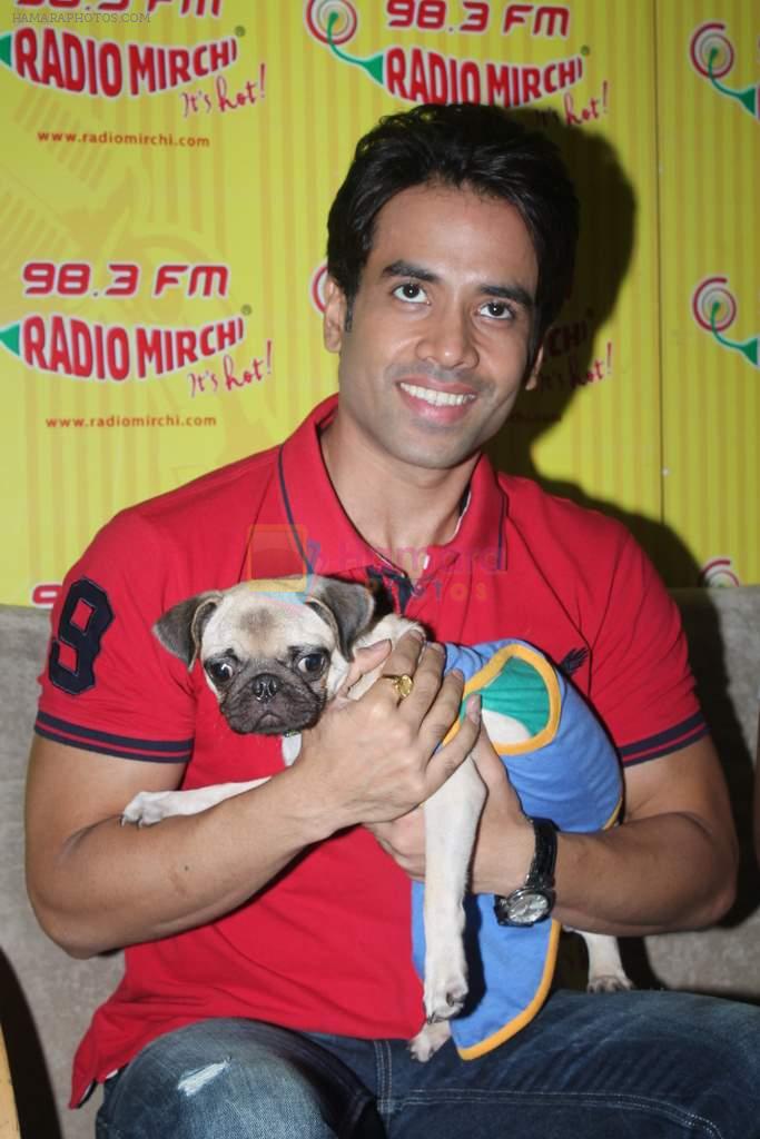 Tusshar Kapoor with dog Macho on the sets of Radio Mirchi to promote Kya Super Kool Hain Hum in Lower parel, Mumbai on 25th June 2012