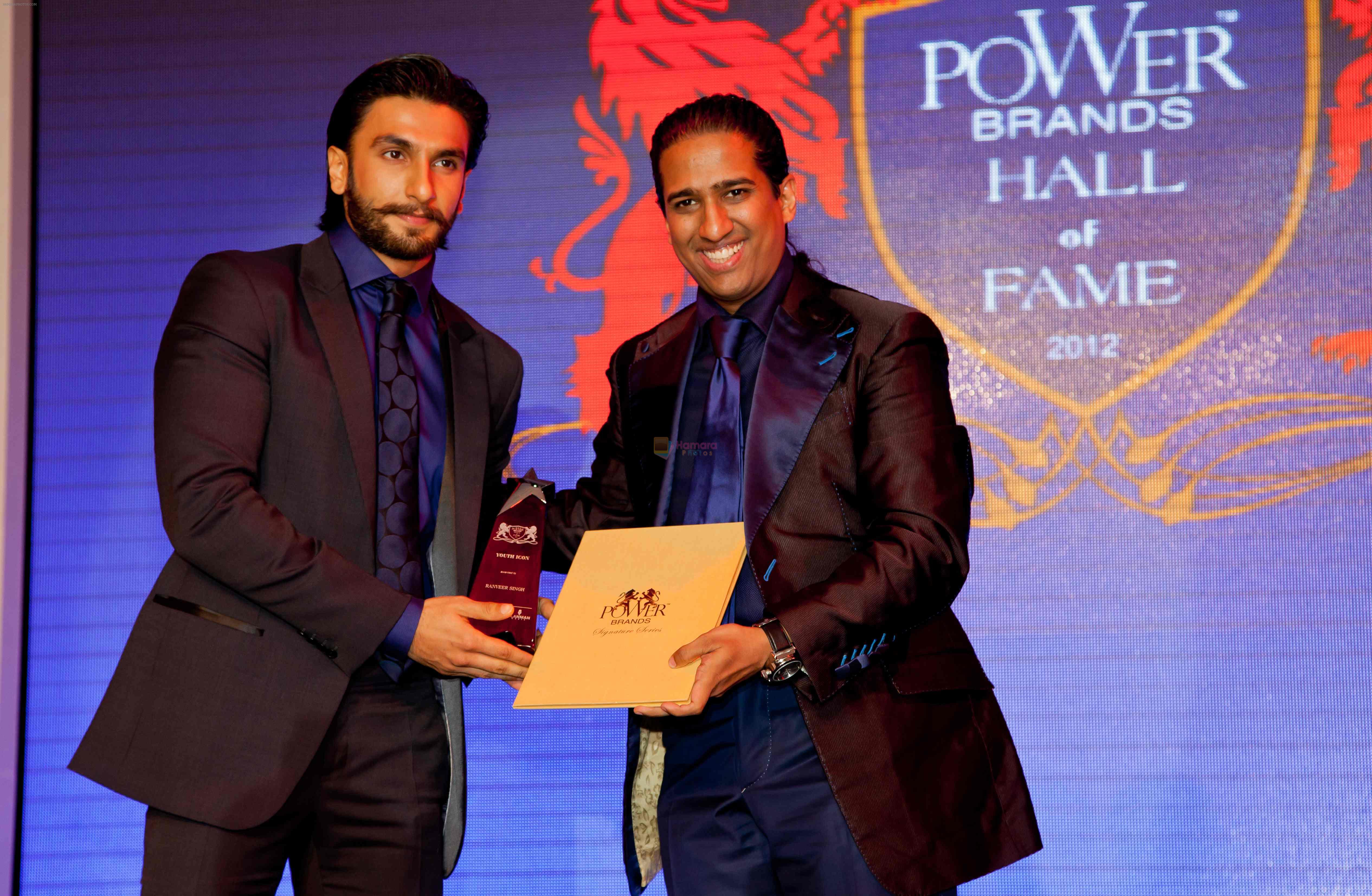 Prof. Chaudhuri awarding Ranveer Singh at the launch of PowerBrands Rising Stars 2012-13 in Dubai on 29th Aug 2012