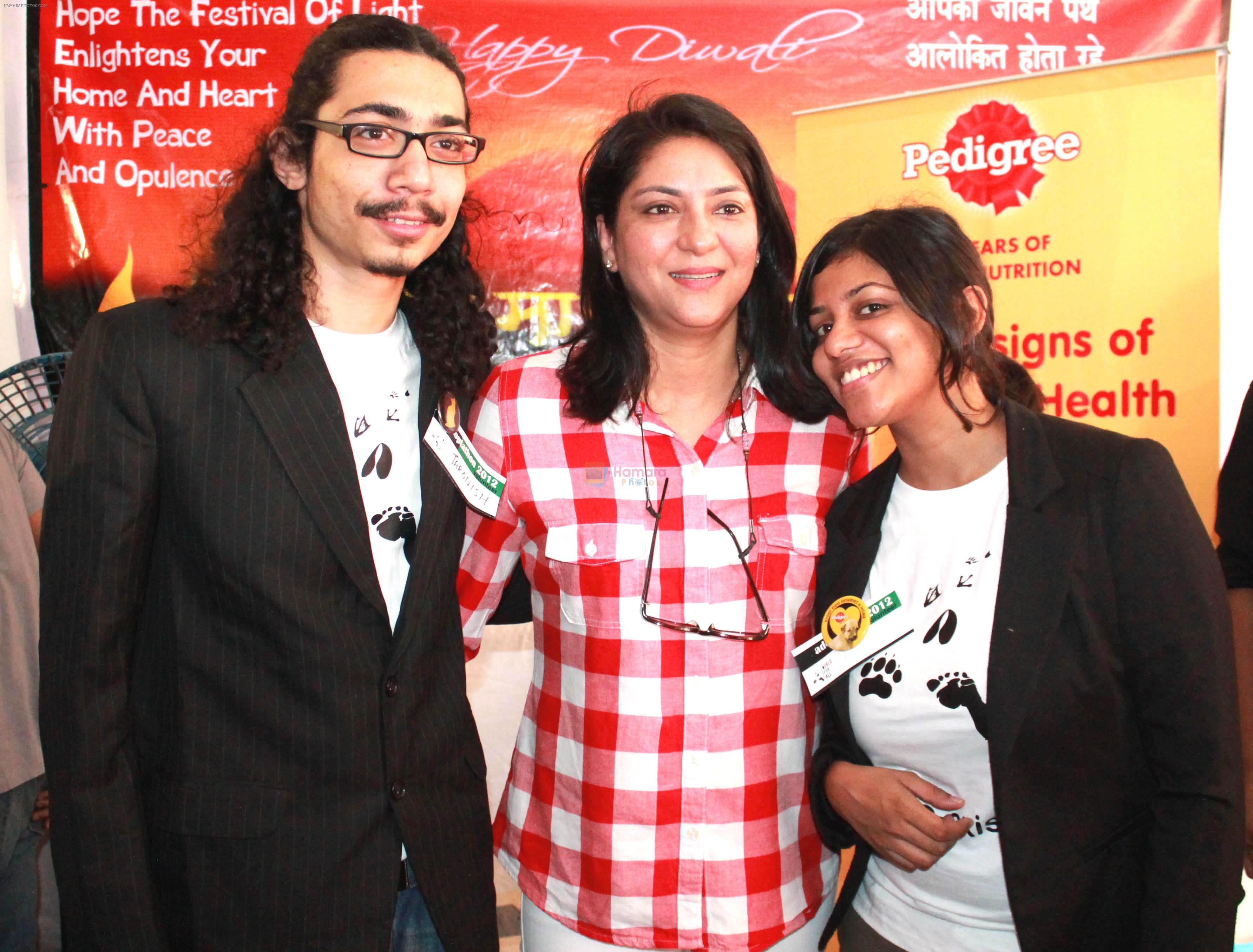 Priya Dutt with Taronish Balsara and Ruchi Nadkarni,Founders World for All at Adoptathon 2012
