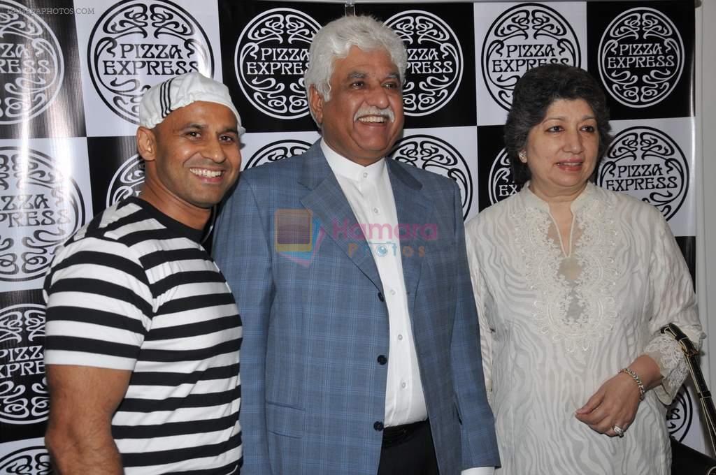 Rakesh and Deepika Mittal with Johney Rai, international trainer at Pizza Express launch in Colaba, Mumbai on 19th Dec 2012