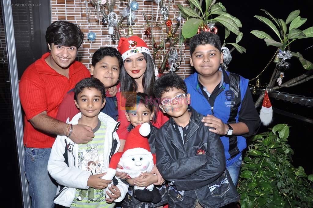 Rakhi Sawant spends Christmas with kids at home in Andheri, Mumbai on 24th Dec 2012