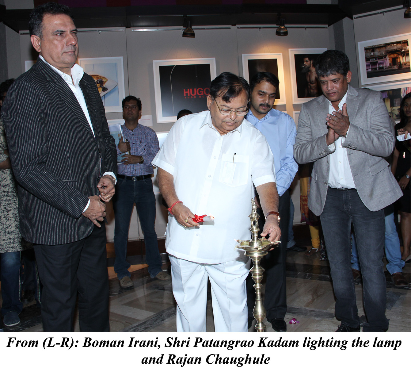 Boman Irani, Shri Patangrao Kadam lighting the lamp and Rajan Chaughule