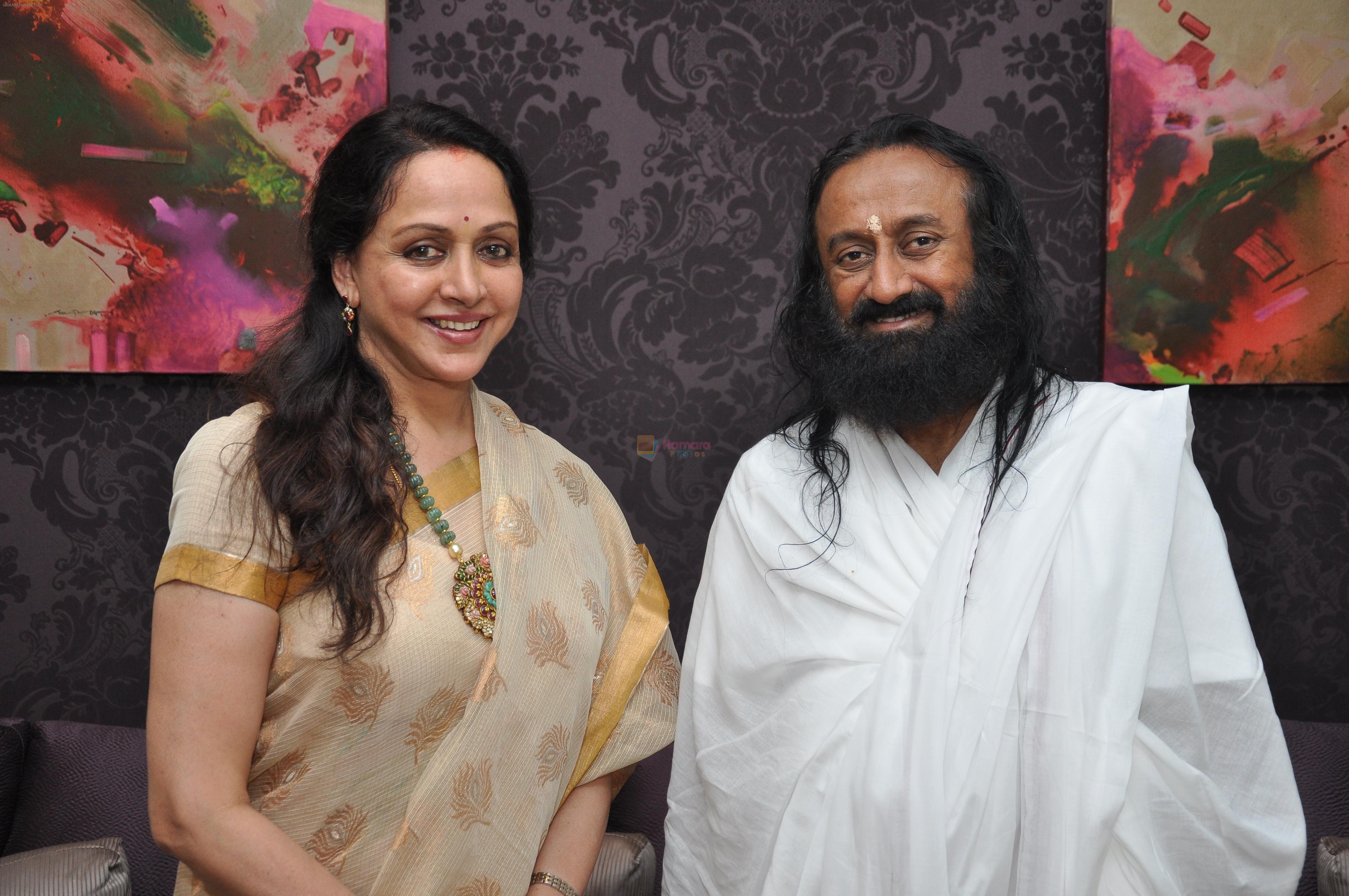 Hemaji with Sri Sri Ravishankar at Hema Malini's new home named Advitiya inaugurated by Sri Sri Ravi Shankar in Mumbai on 3rd March 2013