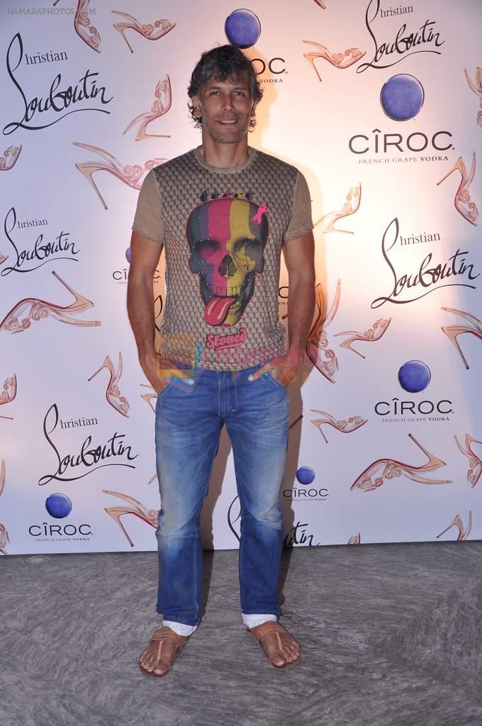 Milind Soman at the launch of Christian Louboutin store launch in Fort, Mumbai on 20th March 2013