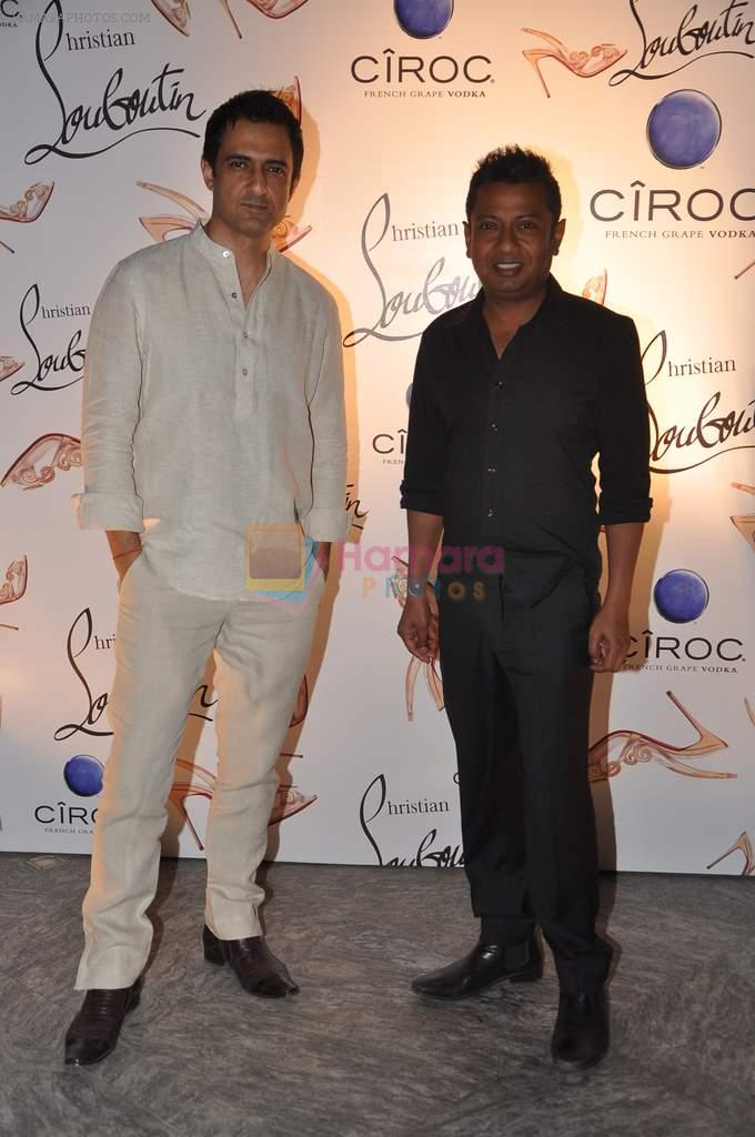 Sanjay Suri, Onir at the launch of Christian Louboutin store launch in Fort, Mumbai on 20th March 2013