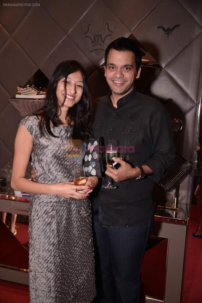 Nachiket Barve with wife at the launch of Christian Louboutin store launch in Fort, Mumbai on 20th March 2013