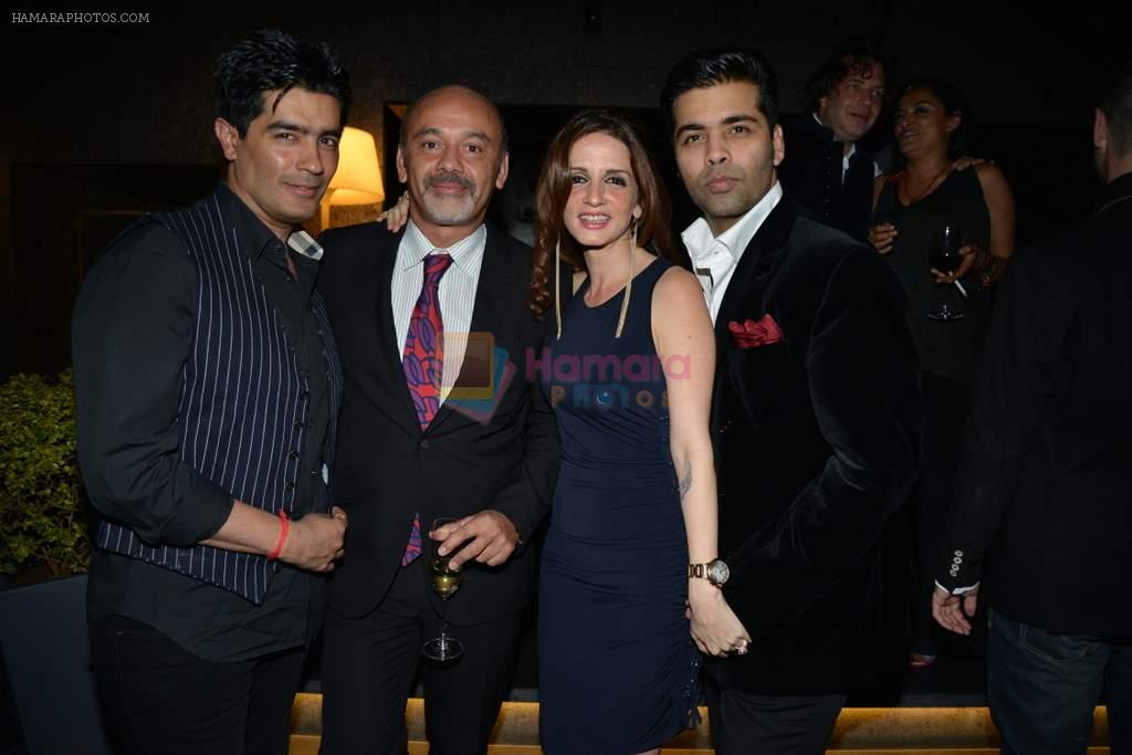 Karan Johar, Suzanne Roshan, Manish Malhotra at the launch of Christian Louboutin store launch in Fort, Mumbai on 20th March 2013