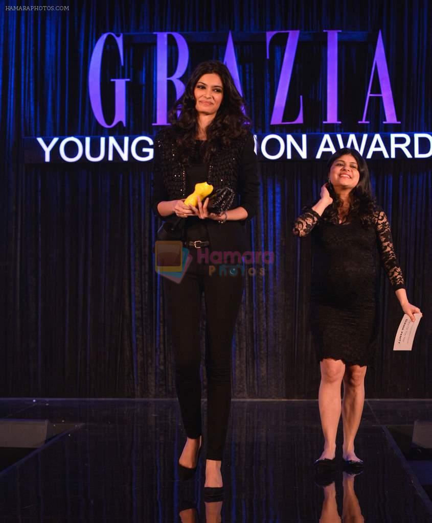 Diana Penty after receiving Face of the Year Award from Mehernaaz at the _Grazia Young Fashion Awards 2013_.
