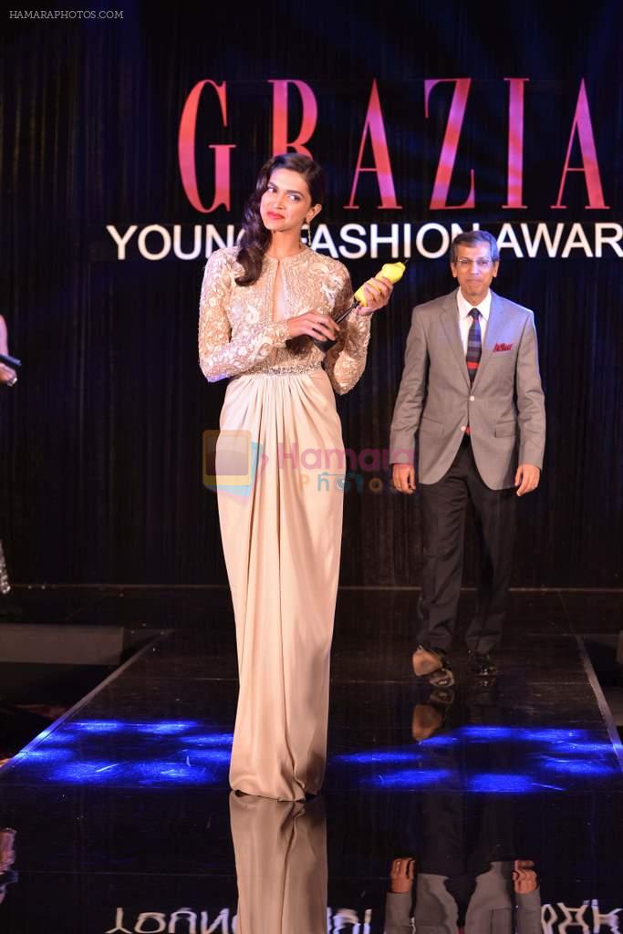 Deepika Padukone after receiving the Grazia Young Fashion Awards 2013 Girl of the Year.,