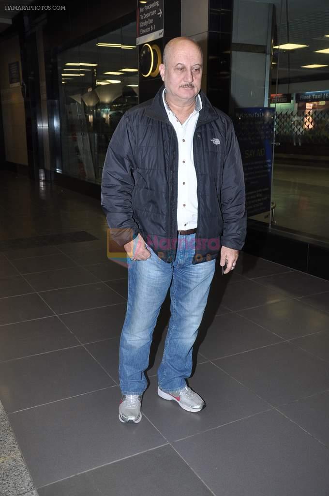 Anupam Kher return from TOIFA 2013 in Mumbai Airport on 9th April 2013