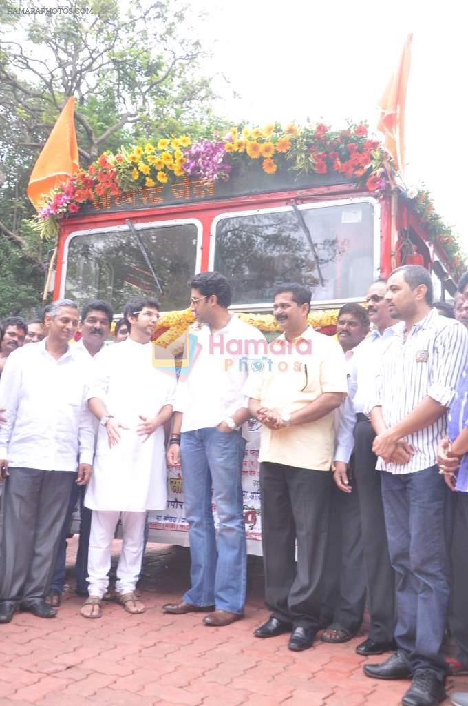 Abhishek Bachchan flags off 2 BEST buses along with Mayor of Mumbai Sunil Prabhu and Yuva Sena President Aditya Thackrey in Mayor's Bungalow on 8th July 2013