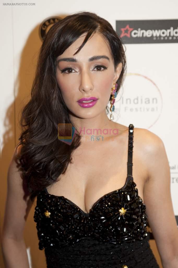 Actress and Brand Ambassador Feryna Wazheir shines on the red carpet at gala opening of London Indian Film Festival. Credit - Photos by www.saiphotography.com