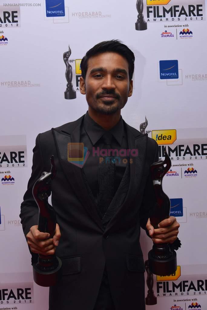 Dhanush with the Black Lady for Best Actor Award  (3) (Tamil) at _60th Idea Filmfare Awards 2012