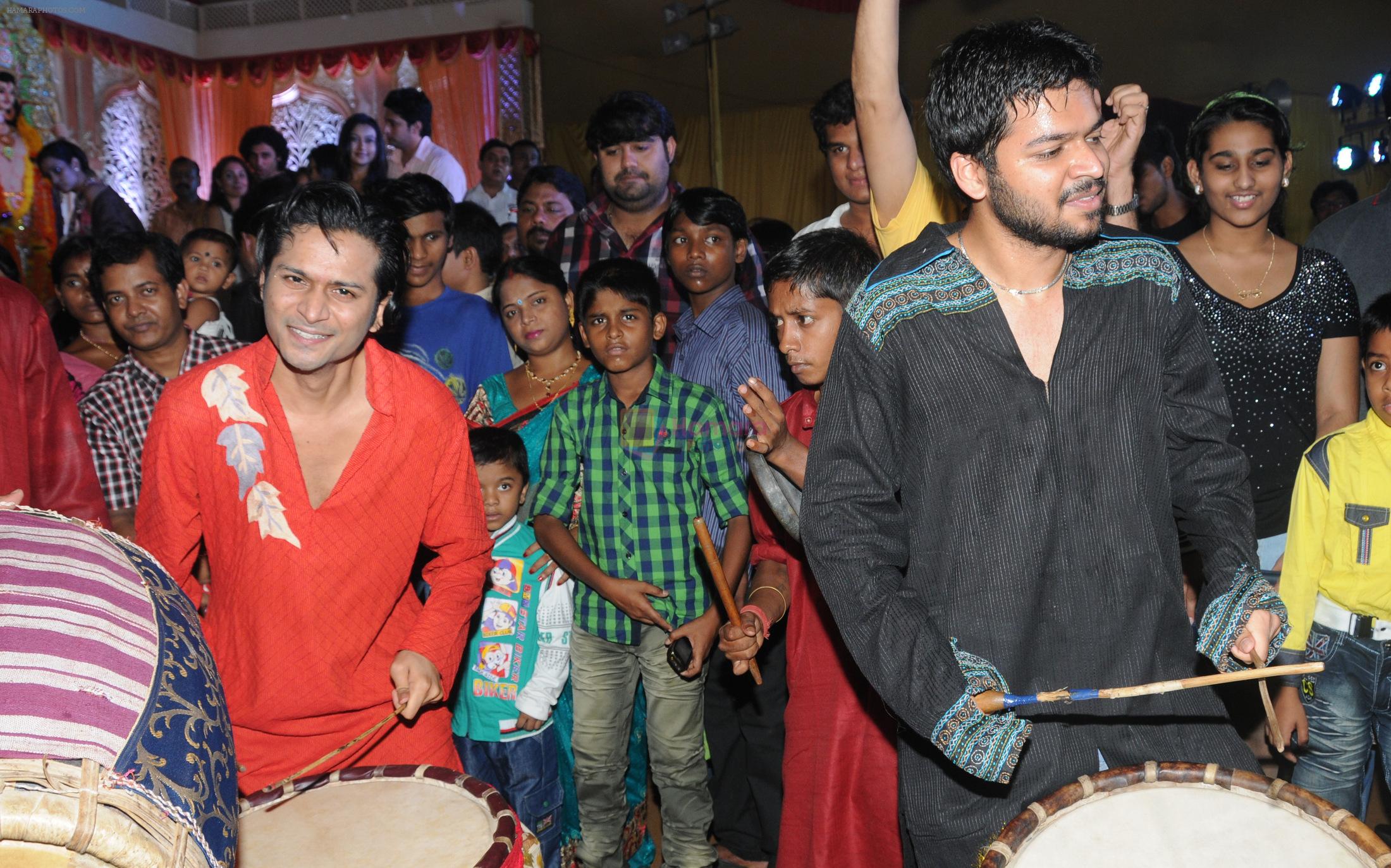 Roman and Romeer Sen at Dussera celebration at Andheri Durgautsav,spearheaded by Krishendu Sen in Mumbai on 13th Oct 2013