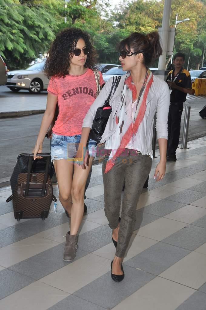 Kangana Ranaut, Priyanka Chopra leave for Delhi to promote Krrish 3 in Mumbai Airport on 22nd Oct 2013