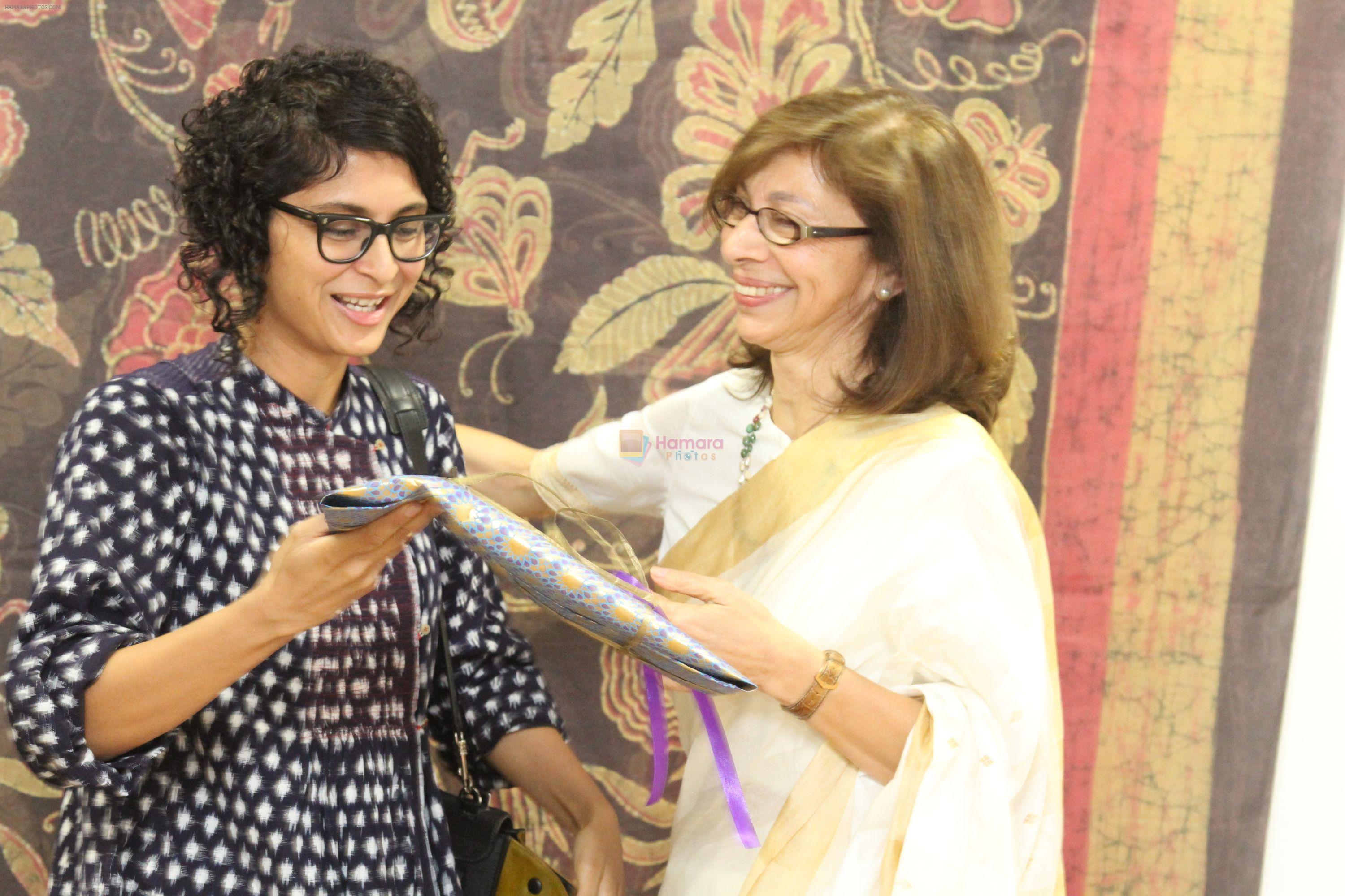 Smita Godrej Crishna presenting Kiran Rao with a souvenir from the exhibition of Handmade Batik Originals at Godrej Bhavan