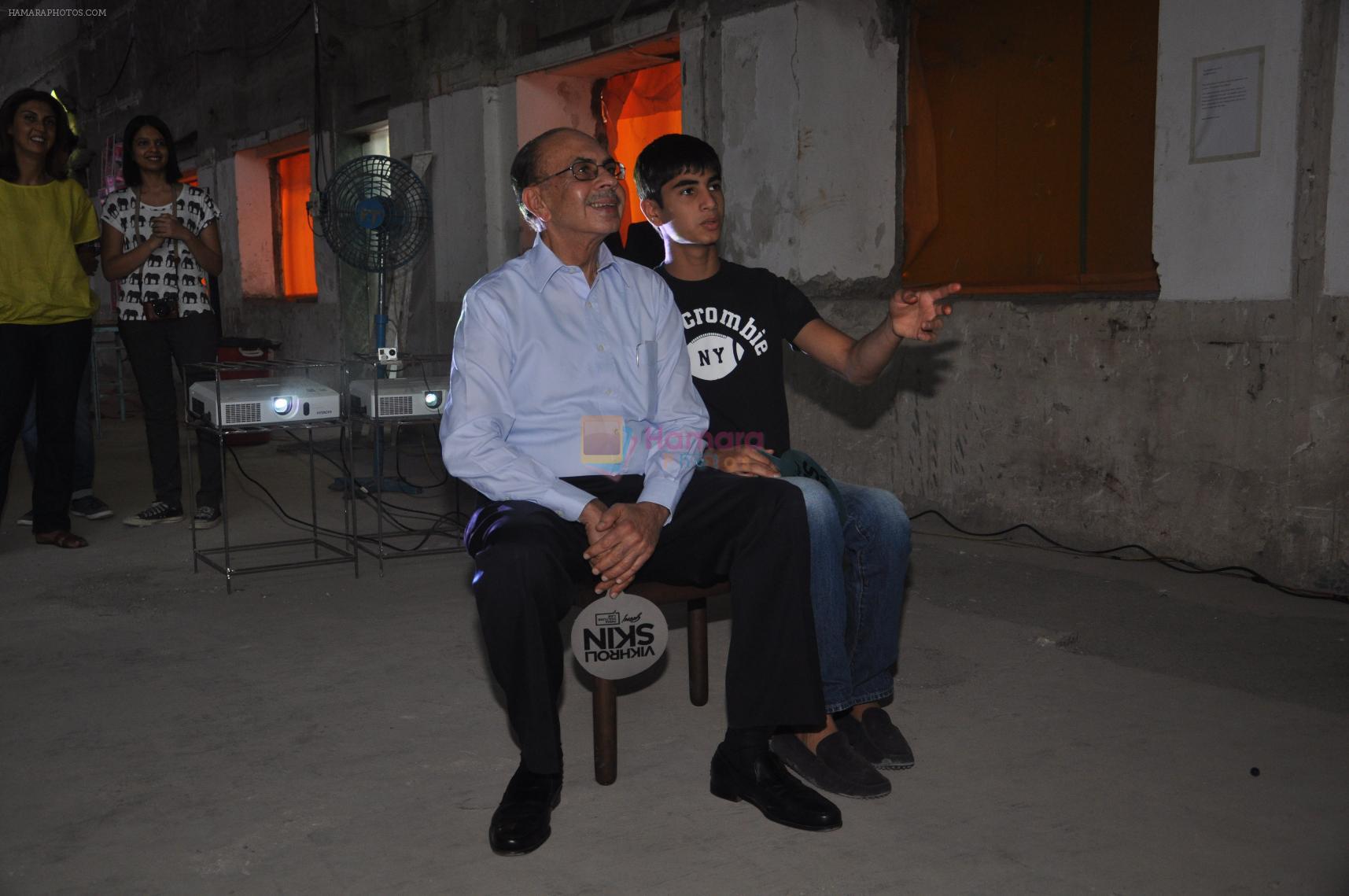 Mr. Adi Godrej with his grandson Aryaan Dubash watching the interactive art installation by Aditi Kulkarni at Godrej Vikhroli skin event in Mumbai on 15th Dec 2013