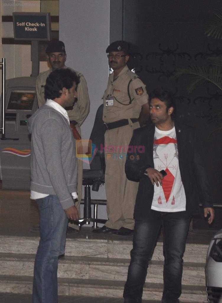 Abhishek Bachchan, Uday Chopra snapped leaving private jet in Mumbai on 17th Dec 2013