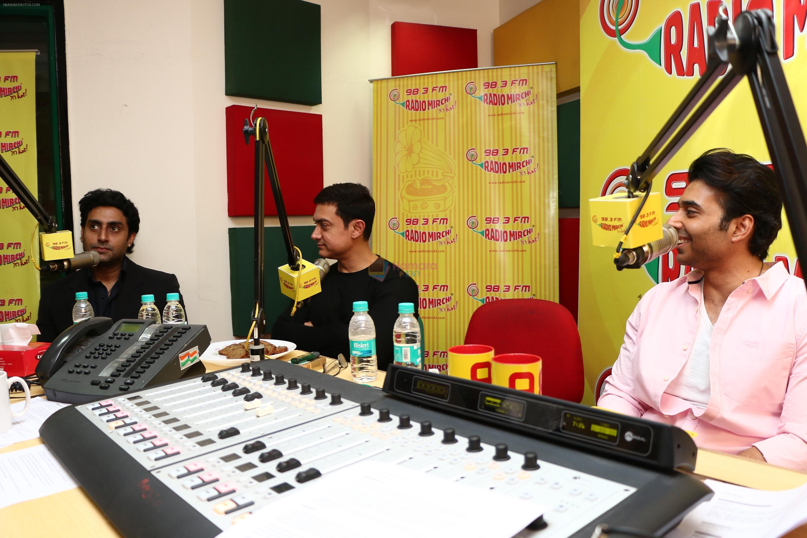 Aamir Khan, Abhishekh Bachchan and Uday Chopra at Radio Mirchi studio for promotion of their upcoming movie Dhoom 3