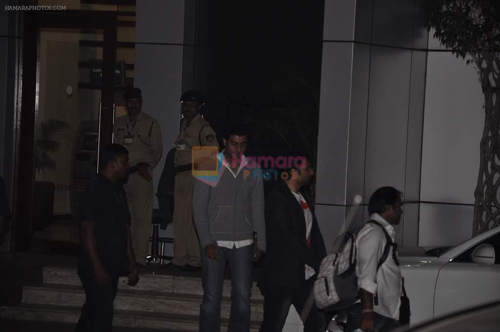 Abhishek Bachchan, Uday Chopra snapped leaving private jet in Mumbai on 17th Dec 2013