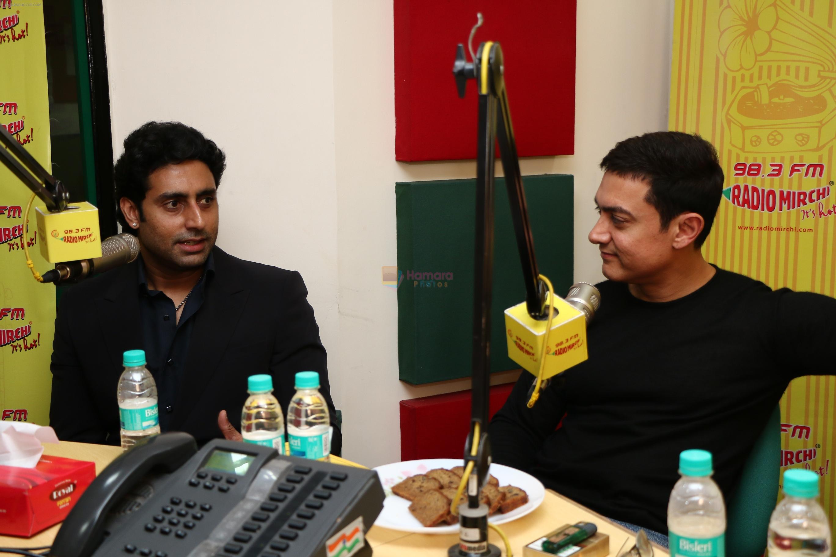 Abhishekh Bachchan and Aamir Khan at Radio Mirchi studio for promotion of their upcoming movie Dhoom 3