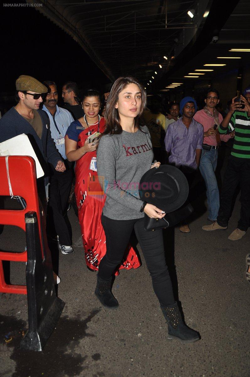 Saif Ali Khan, kareena Kapoor leave for their new years vacation in Mumbai on 25th Dec 2013