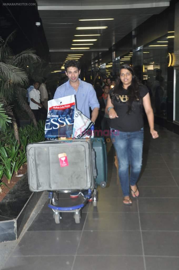 John Abraham arrived at airport in Mumbai on 3rd Jan 2014