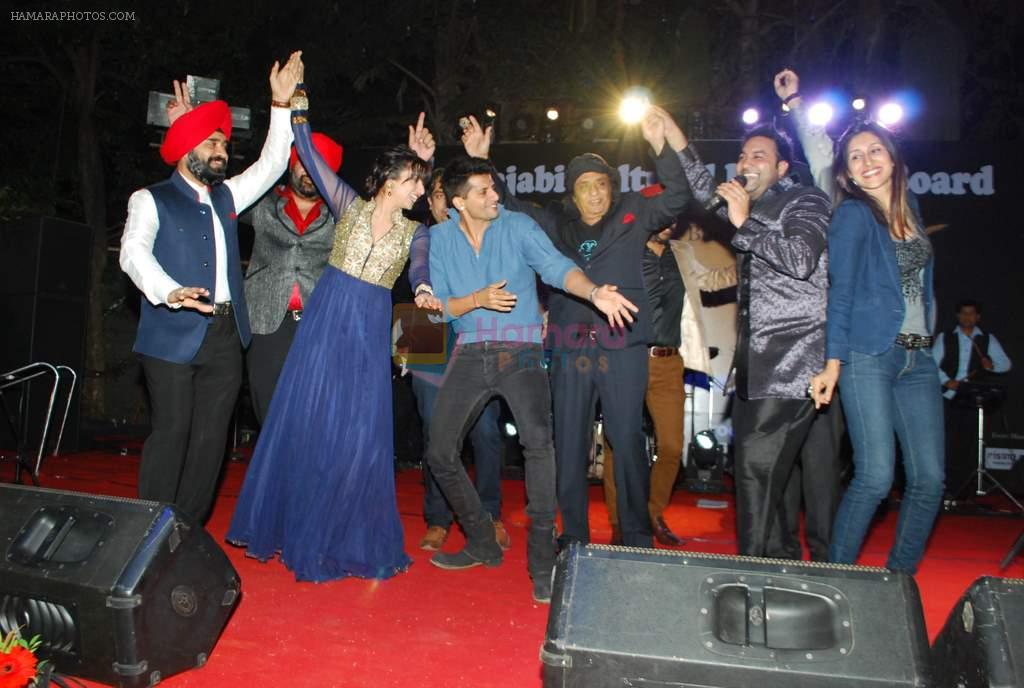 Kulraj Randhawa, Teejay Sidhu, Karanvir Bohra at Lohri festival in Raheja Classique, Mumbai on 11th Jan 2014