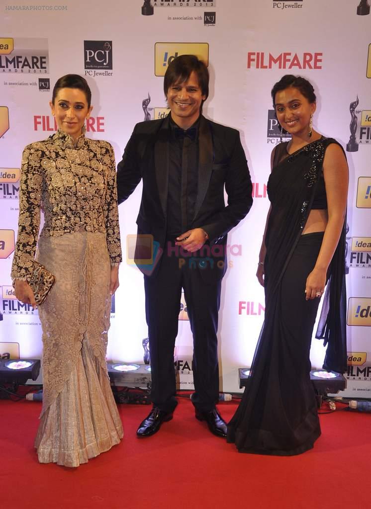 Karishma Kapoor, Vivek Oberoi with wife walked the Red Carpet at the 59th Idea Filmfare Awards 2013 at Yash Raj