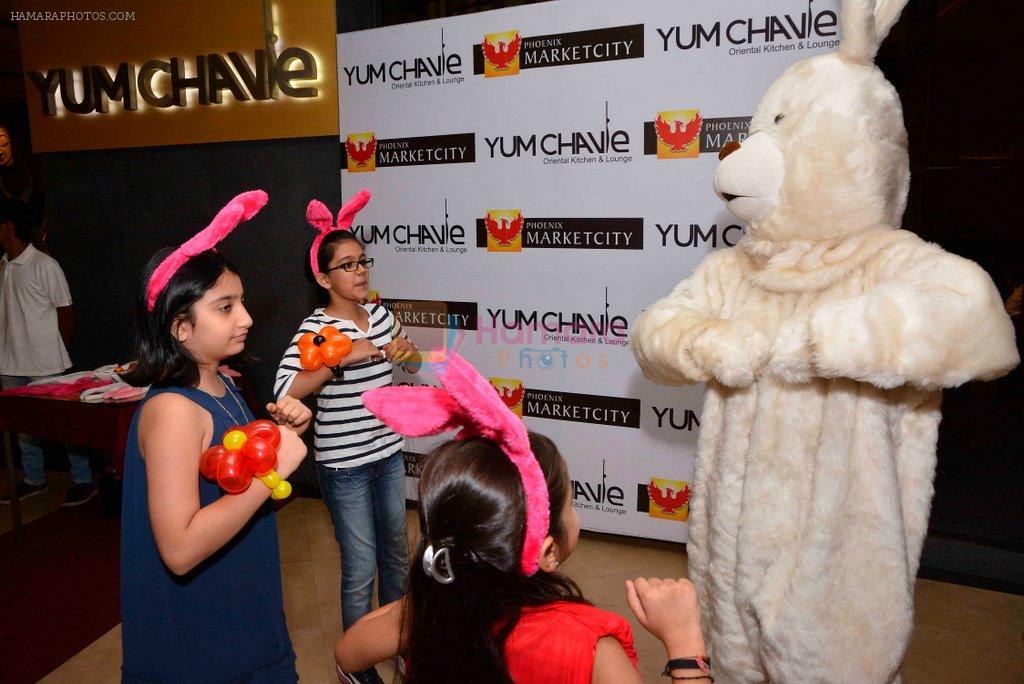 Kids dancing with Easter Bunny at Phoenix Market City easter party in Mumbai on 14th April 2014