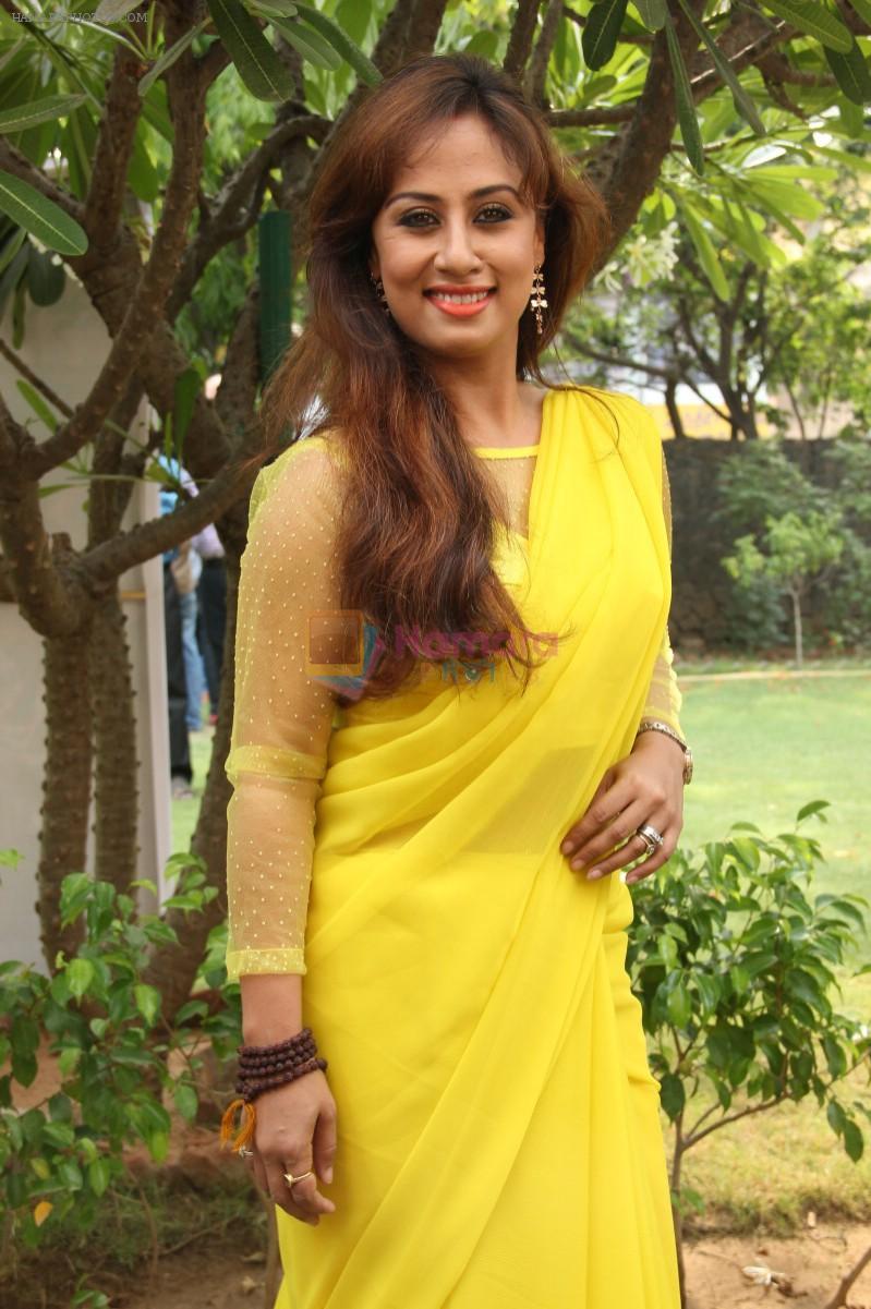 Maanu Actress New Stills in Yellow Sari