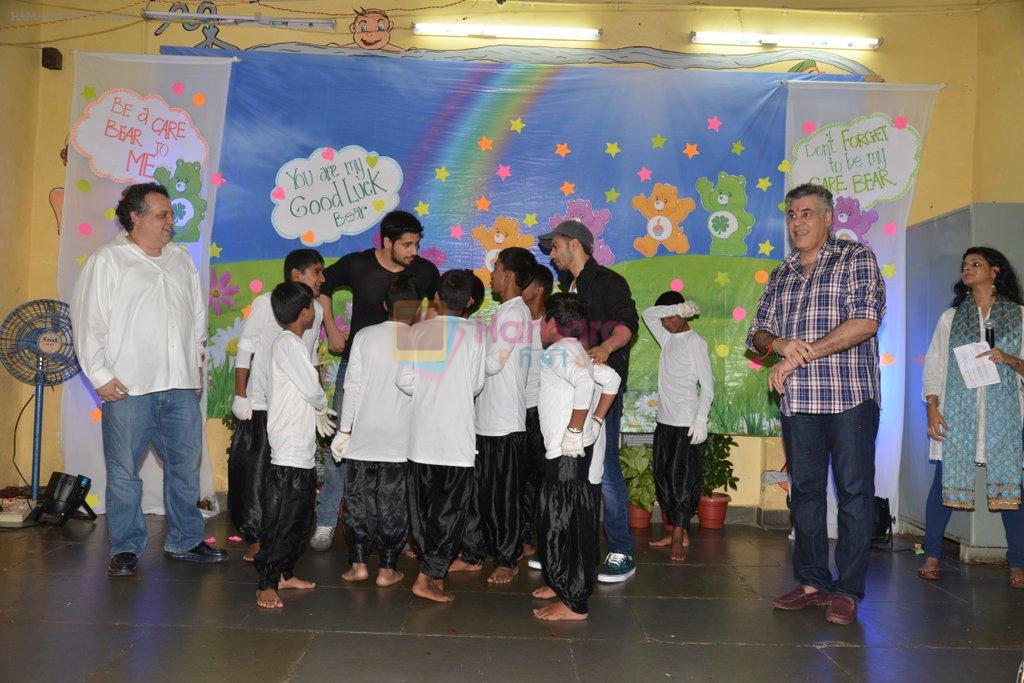 Varun Dhawan, Sidharth Malhotra interact with kids of Ashray NGO and Abu Jani, Sandeep Kosla charity in Bandra, Mumbai on 23rd Aug 2014