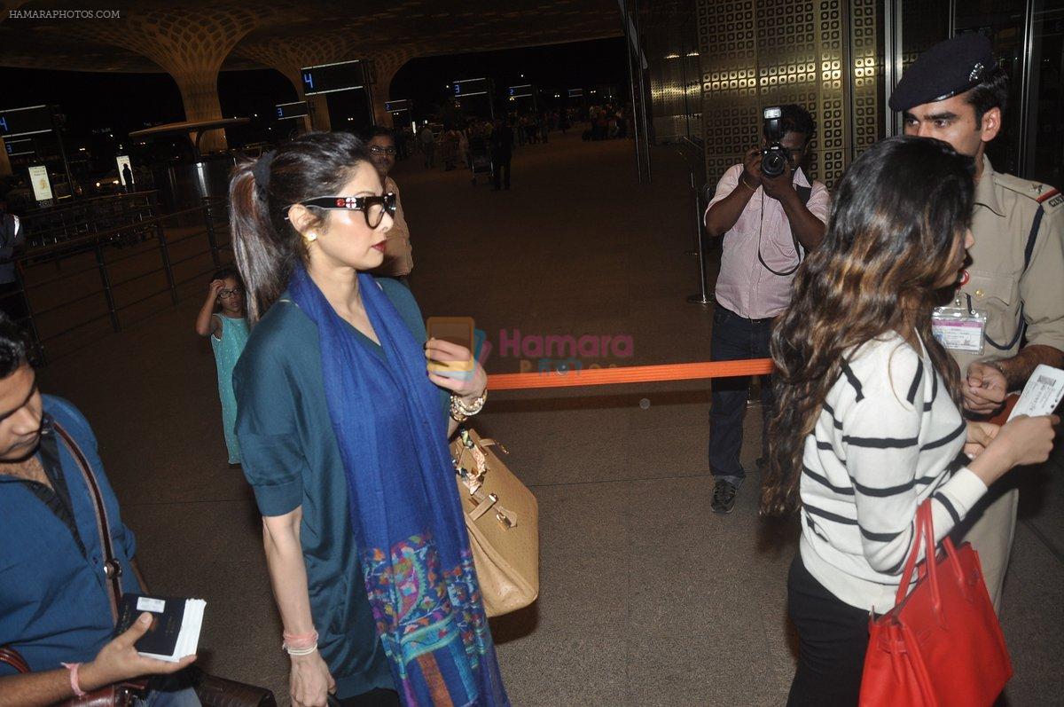 Sridevi snapped with Boney Kapoor & Daughters in Mumbai Airport on 11th Sept 2014