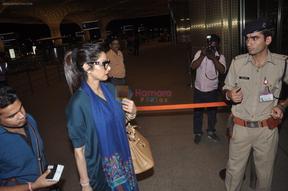 Sridevi snapped with Boney Kapoor & Daughters in Mumbai Airport on 11th Sept 2014