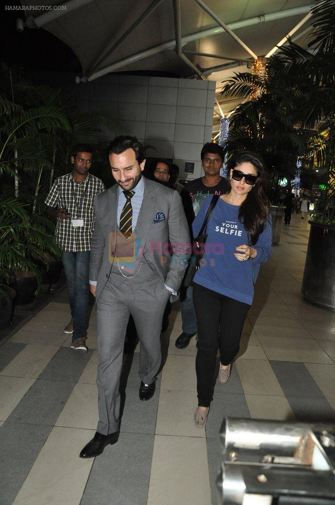 Saif Ali Khan, Kareena Kapoor snapped back from Delhi on 26th Oct 2014