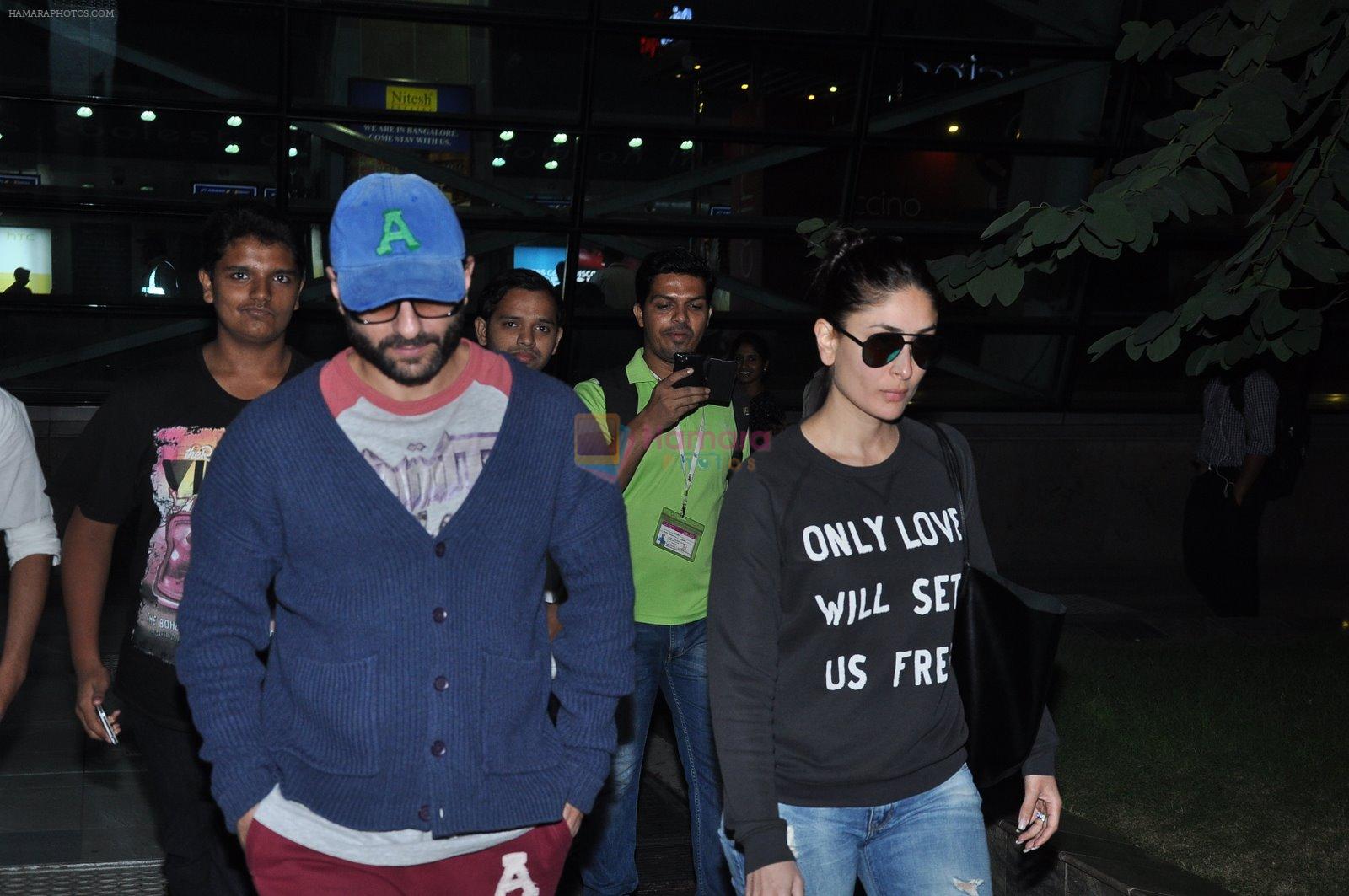 Kareena Kapoor, Saif Ali Khan snapped in Mumbai Airport on 21st Nov 2014