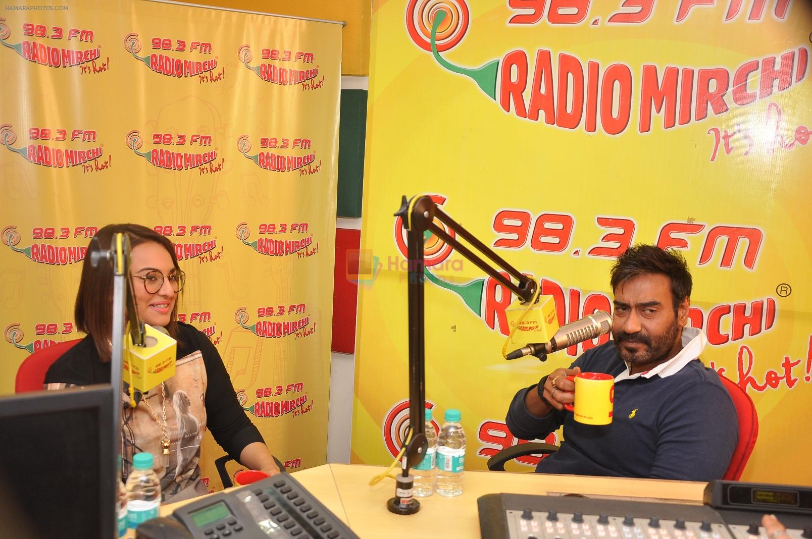 Sonakshi Sinha & Ajay Devgn at Radio Mirchi Mumbai studio for the promotion of upcoming movie Action Jackson