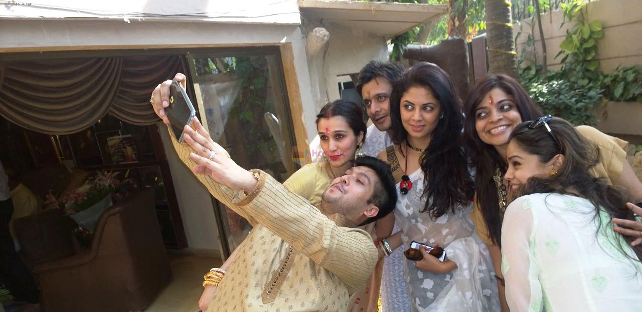 Bappa Lahiri clicks a selfie with wife Tanisha, Agam Pandit, Kavita Kaushik, Nivedita Basu and Sumona Chakravorty at Bappi Lahiri's Saraswati Puja