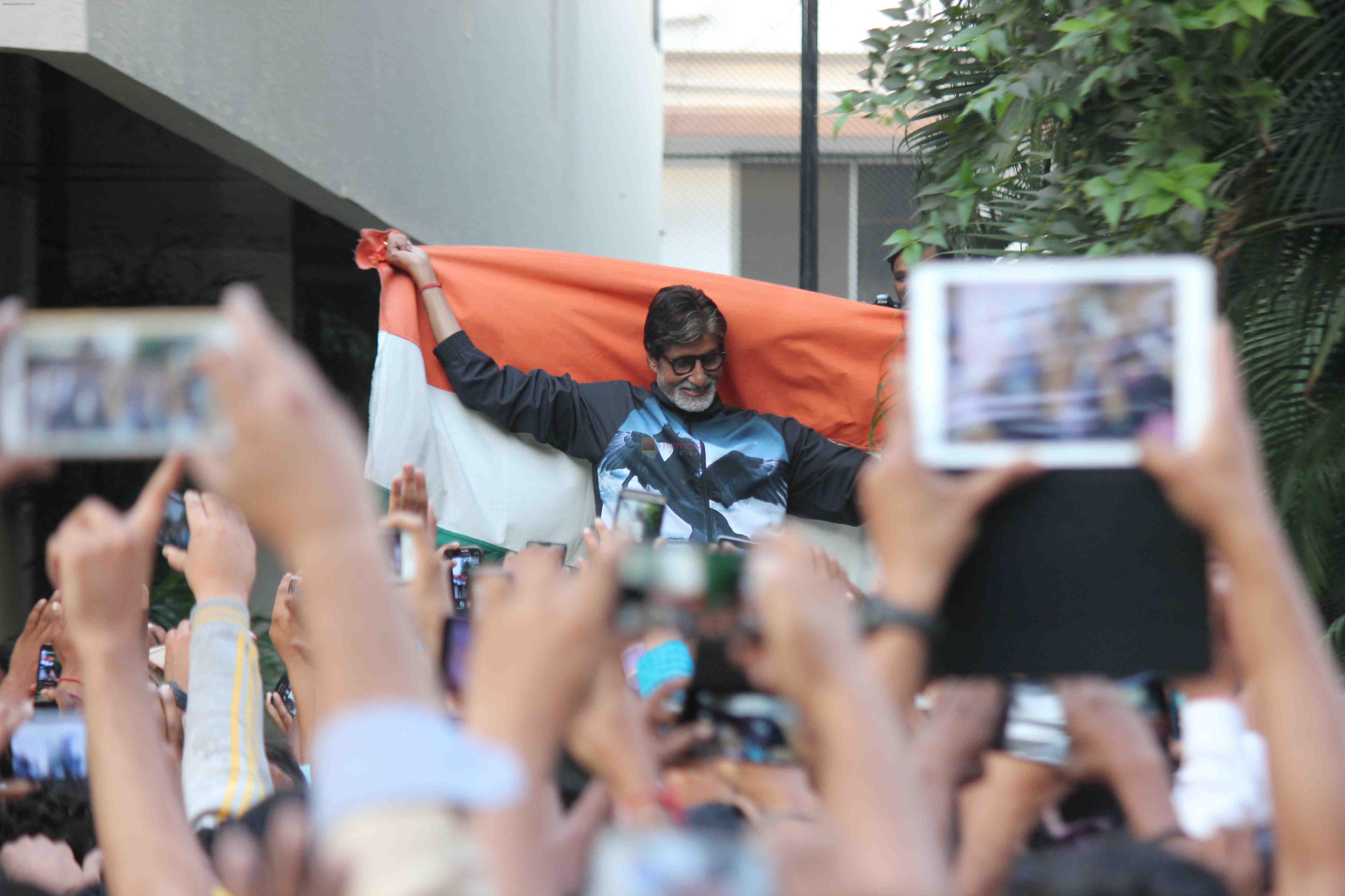 Amitabh Bachchan celebrates with fans India's world cup win over Pakistan at his residence Jalsa in Mumbai on 15th Feb 2015